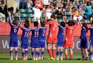 Jul 1, 2015; Edmonton, Alberta, CAN; Japan celebrates after beating England in the semifinals of the FIFA 2015 Women's World Cup at Commonwealth Stadium. Mandatory Credit: Erich Schlegel-USA TODAY Sports