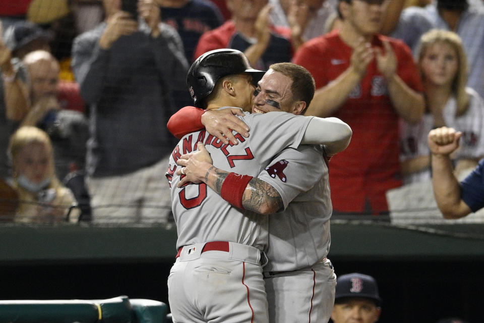 Boston Red Sox' s Enrique Hernandez, left, celebrates his two-run home run with Christian Vazquez, right, during the ninth inning of a baseball game against the Washington Nationals Saturday, Oct. 2, 2021, in Washington. The Red Sox won 5-3.(AP Photo/Nick Wass)