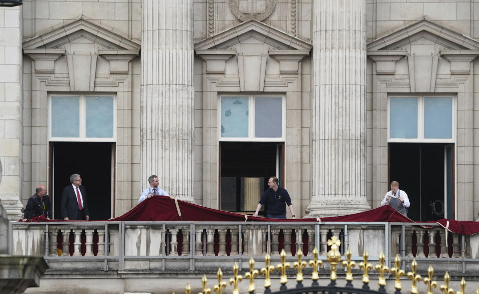 <p>Final preparations on the balcony of Buckingham Palace, London, Saturday, May 6, 2023 ahead of the Coronation of King Charles III. (Owen Humphreys/PA via AP)</p> 