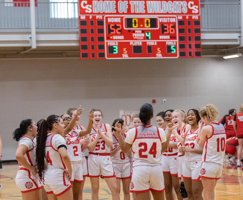 The Canton South girls basketball teams sings "Happy Birthday" to Madison Gordon (24) following their Division II sectional final win over Field, Saturday, Feb. 24, 2024.