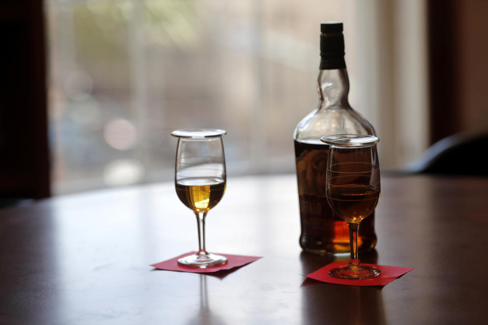 A whiskey sample is seen in a tasting room during a media preview for the Sazerac house, in New Orleans, Tuesday, Sept. 10, 2019. Visitors to New Orleans who want to learn more about cocktails will soon have a new place to go. No, it's not another bar. The Sazerac House is a six-story building on the city's famed Canal Street owned by the Sazerac Company, a Louisiana-based spirits maker, featuring the signature New Orleans drink called the Sazerac.Tasting is encouraged, and in addition to free samples given to visitors, there will also be special classes and tastings offered daily. (AP Photo/Gerald Herbert)