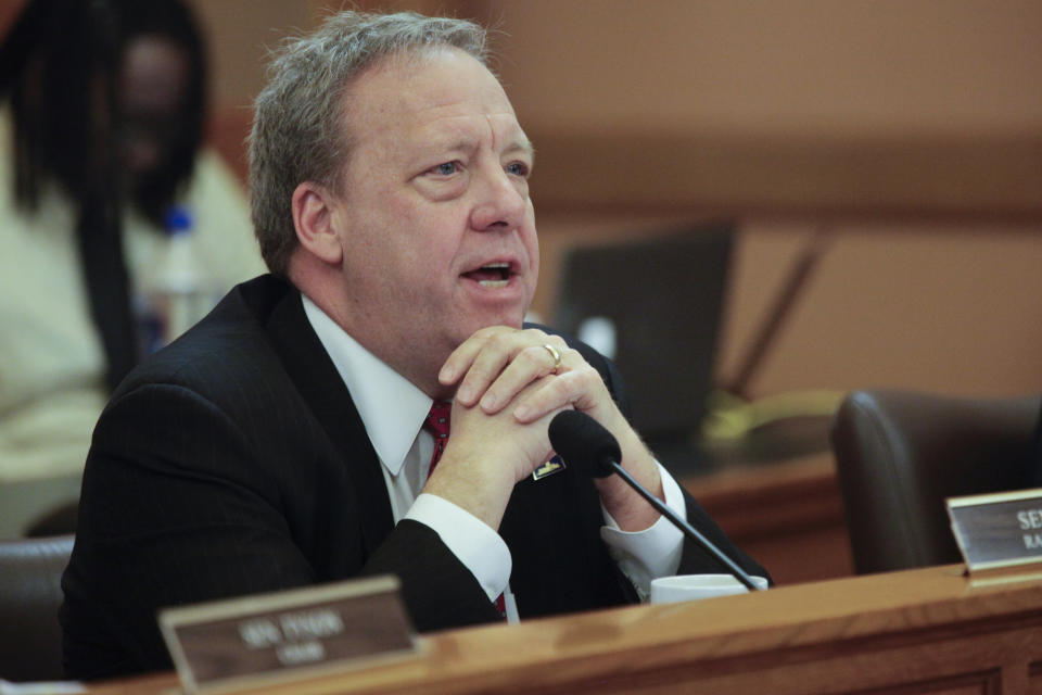 Kansas state Sen. Tom Holland, D-Baldwin City, asks a question during a Senate tax committee hearing on a bill that would give a 70% income tax credit to donors to what are sometimes called pregnancy resource or crisis pregnancy centers, Thursday, Feb. 2, 2023, at the Statehouse in Topeka, Kan. The centers are operated by abortion opponents and offer free services such as pregnancy tests, sonograms and parenting classes. (AP Photo/John Hanna)