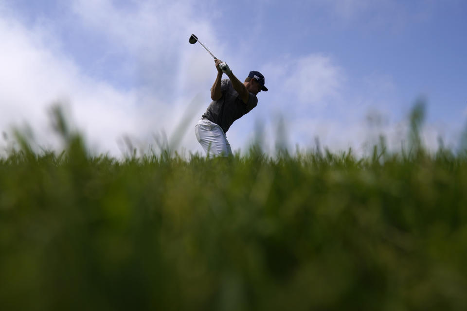 Kyle Westmoreland hits his tee shot on the 14th hole during a practice round of the U.S. Open Golf Championship, Monday, June 14, 2021, at Torrey Pines Golf Course in San Diego. (AP Photo/Gregory Bull)