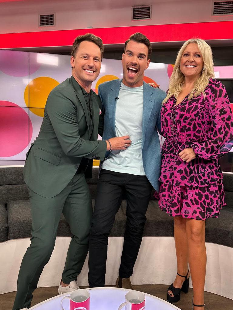 Jesse Baird (centre) with Channel 10 entertainment reporter Angela Bishop (right). Picture: Instagram