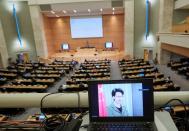 Lam, chief executive of Hong Kong, addresses by video link the Human Rights Council in Geneva