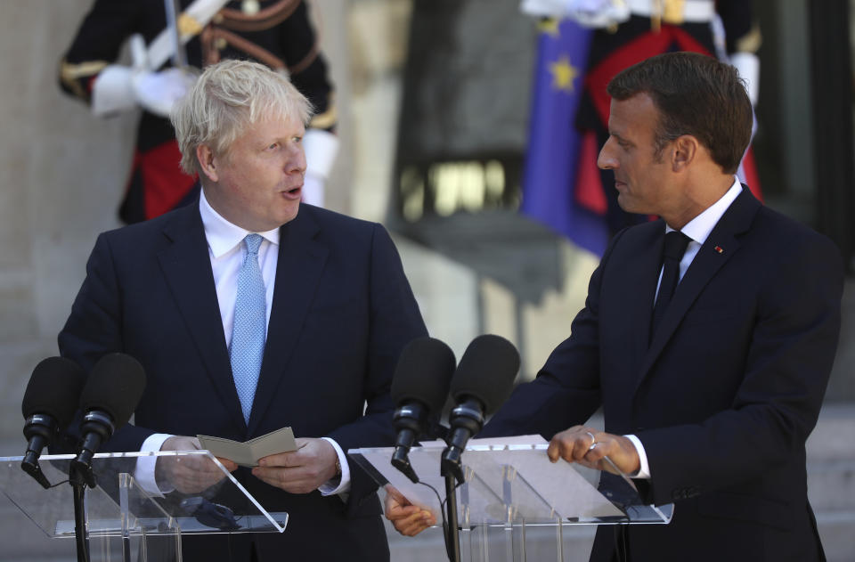 Britain's Prime Minister Boris Johnson speaks to the media after being greeted by French President Emmanuel Macron at the Elysee Palace, Thursday, Aug. 22, 2019 in Paris. Boris Johnson traveled to Berlin Wednesday to meet with Chancellor Angela Merkel before heading to Paris to meet with French President Emmanuel Macron. (AP Photo/Daniel Cole)