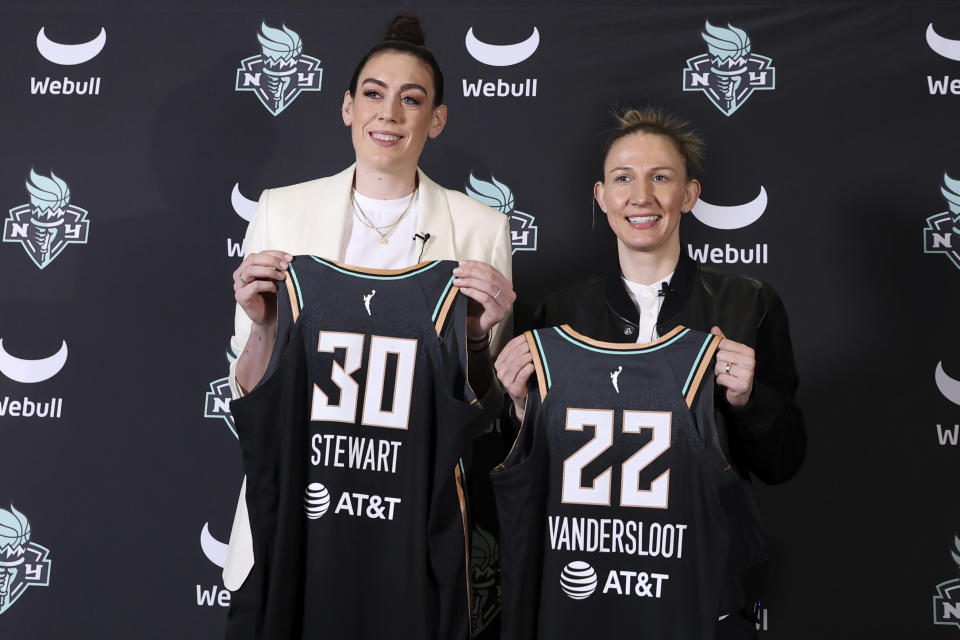 New York Liberty forward Breanna Stewart and guard Courtney Vandersloot pose for a photo during a news conference on their signings with the team on Feb. 9, 2023, in New York. (AP Photo/Jessie Alcheh)