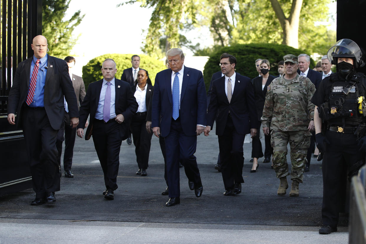 President Donald Trump walks from the White House to visit St. John's Church across Lafayette Park Monday, June 1, 2020, in Washington. (AP Photo/Patrick Semansky)