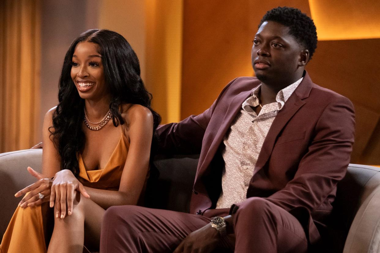 Riah and Trey sit together on a couch during the "Ultimatum" season 2 reunion.