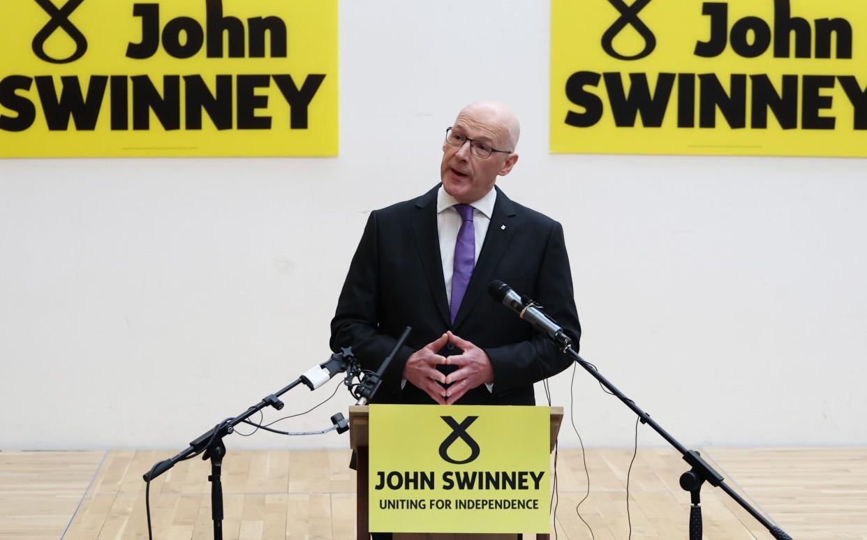 John Swinney is pictured today in Edinburgh as he launched his SNP leadership bid