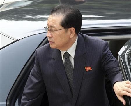 Jang song-thaek, Chief of the Central Administrative Department of the Workers' Party of Korea, exits a car as he arrives at the Ziguangge building of Zhongnanhai, the central government compound, in Beijing, August 17, 2012. REUTERS/China Daily