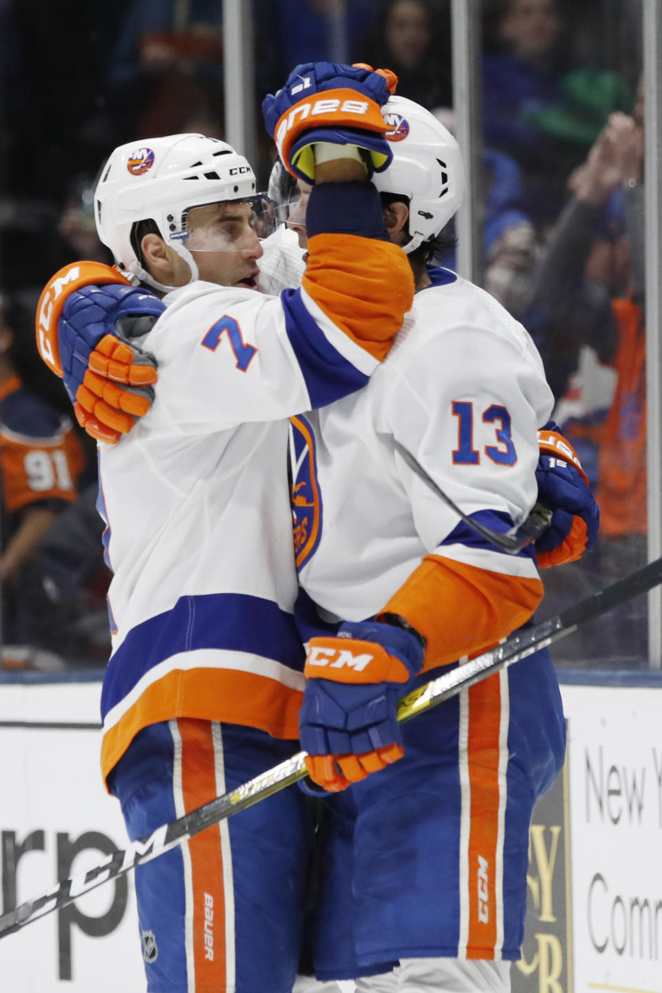 New York Islanders right wing Jordan Eberle (7) celebrates with center Mathew Barzal (13) after Eberle scored his second goal of the night against the Detroit Red Wings, during the second period of an NHL hockey game Friday, Feb. 21, 2020, in Uniondale, N.Y. (AP Photo/Kathy Willens)