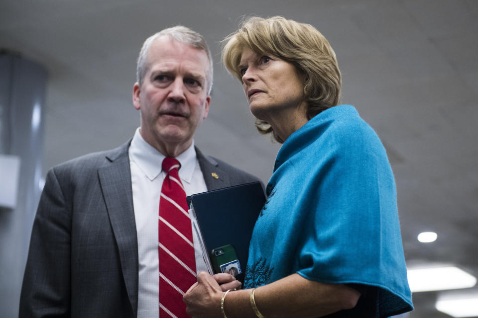 Sens. Dan Sullivan and Lisa Murkowski, Alaska Republicans, consult on Capitol Hill. Murkowski has a more moderate record, including a key vote against repealing Obamacare. (Photo: Tom Williams/CQ Roll Call/Getty Images)