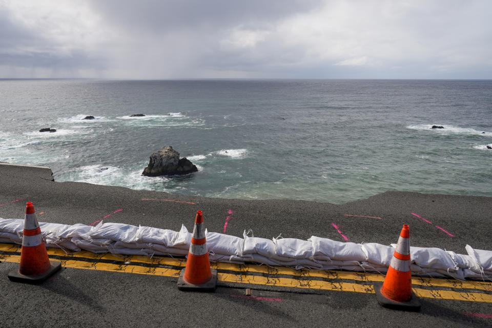 The collapsed section along the southbound lane of Highway 1 at Rocky Creek Bridge is seen, Thursday, April 4, 2024, in Big Sur, Calif. The break has caused the closure of the scenic road. (AP Photo/Godofredo A. Vásquez)