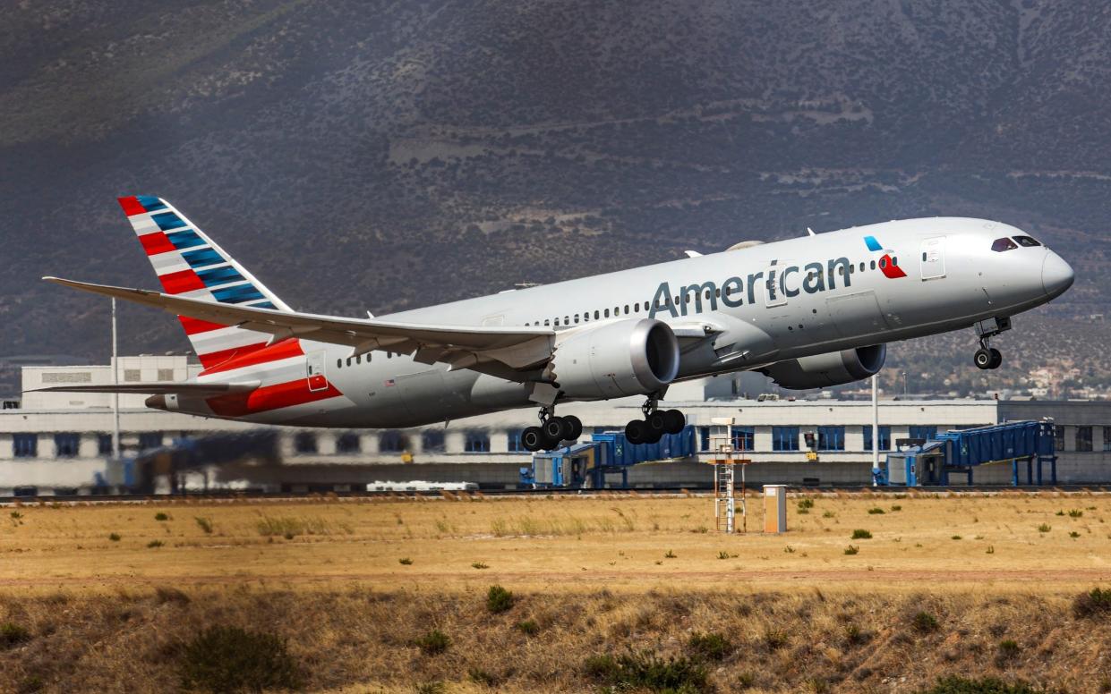 american airlines flights downgrade refund - Getty