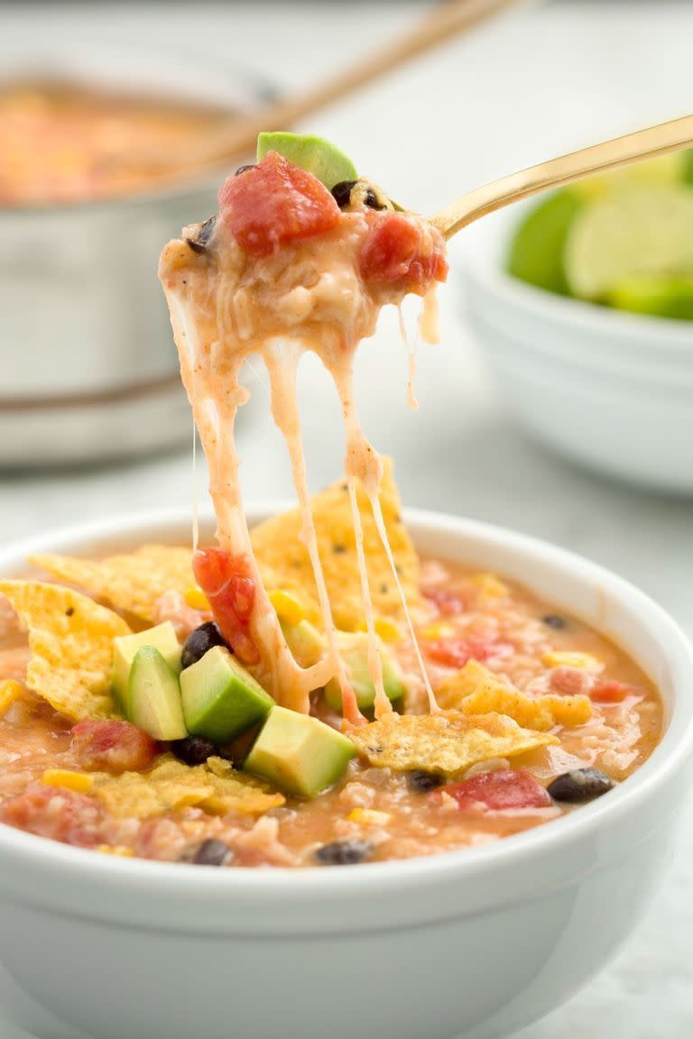 <p>Ever wish you could just have, well, a whole BOWL of burrito toppings? Us too, which is why we had to create this recipe and let's just say, this super-cheesy soup will warm the entire family up.<br><br>Get the <strong><a href="https://www.delish.com/cooking/recipe-ideas/recipes/a45624/burrito-bowl-soup/" rel="nofollow noopener" target="_blank" data-ylk="slk:Burrito Bowl Soup recipe;elm:context_link;itc:0;sec:content-canvas" class="link ">Burrito Bowl Soup recipe</a></strong>. </p>