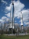 This April 9, 2014 photo shows two NASA rockets on display outside the New York Hall of Science in Corona in the Queens borough of New York. The rockets debuted at the 1964 World’s Fair as part of a space park that captured the excitement of the era’s quest to explore space and get a man on the moon. They are among a number of World’s Fair relics that are still in place. (AP Photo/Beth J. Harpaz)