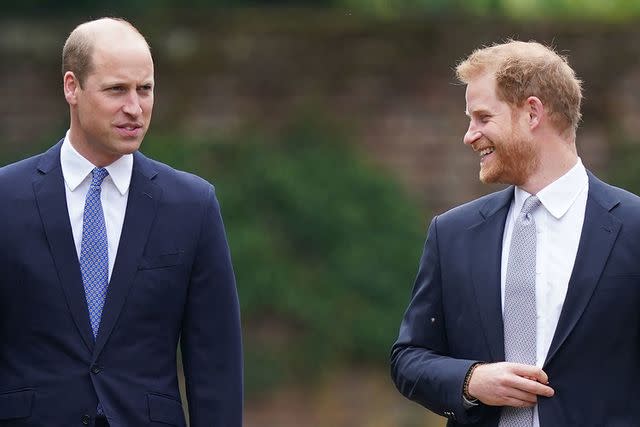 <p>YUI MOK/POOL/AFP via Getty Images</p> Prince William and Prince Harry on July 1, 2021.