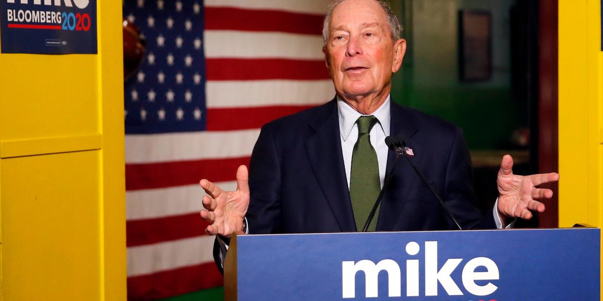 FILE - In this Nov. 26, 2019, file photo, Democratic presidential candidate Michael Bloomberg speaks to the media in Phoenix. Democrats are narrowing Donald Trump's early spending advantage, with two billionaire White House hopefuls joining established party groups to target the president in key battleground states that are likely to determine the outcome of next year's election.(AP Photo/Rick Scuteri, File)