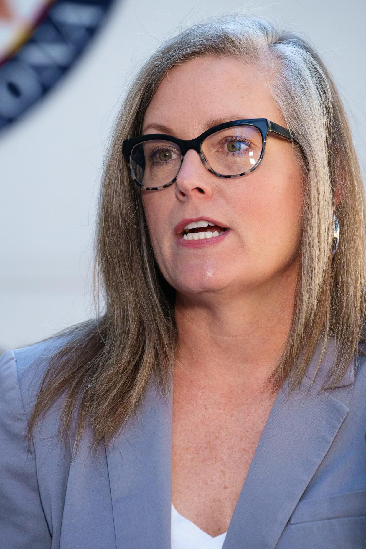 Arizona gubernatorial candidate Katie Hobbs speaks at a press conference outside Arizona Attorney General Mark Brnovich's office in Phoenix on Sept. 24, 2022.