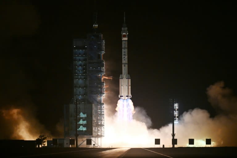 A Long March-2F carrier rocket, carrying the Shenzhou-18 spacecraft and a crew of three astronauts, lifts off from the Jiuquan Satellite Launch Center (GREG BAKER)