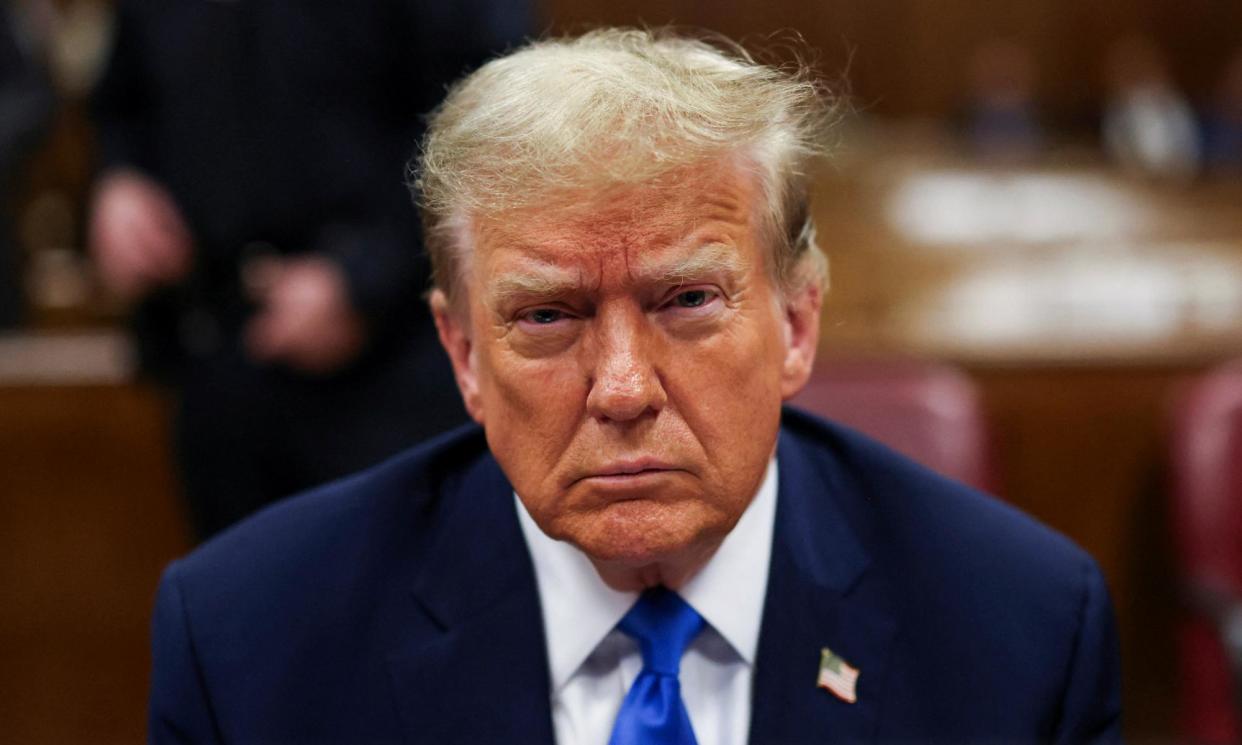 <span>Donald Trump sits in the courtroom in New York City on Thursday.</span><span>Photograph: Brendan McDermid/Reuters</span>