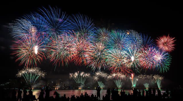 300,000 people are expected to jostle along the Perth foreshore on Australia Day for the best view of the City of Perth's Skyworks show. Photo: Getty