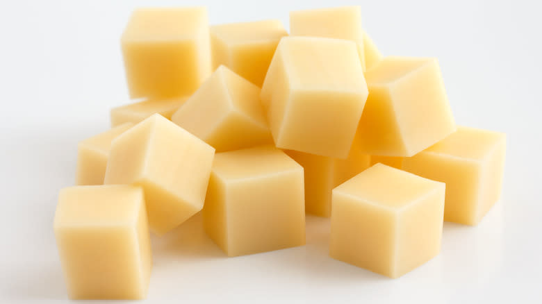cubed cheese in a pile