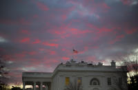 <p> FILE - In this Jan. 27, 2017, file photo, day breaks over the White House in Washington. Two weeks into his presidency, Donald Trump has thrown Washington into a state of anxious uncertainty. Policy pronouncements sprout up from the White House in rapid succession. Some have far-reaching implications, most notably Trump’s temporary refugee and immigration ban, but others disappear without explanation, including planned executive actions on cybersecurity and the president’s demand for an investigation into unsubstantiated voter fraud. The day’s agenda can quickly be overtaken by presidential tweets, which often start flashing on smartphones just as the nation’s capital is waking up. (AP Photo/Pablo Martinez Monsivais, File) </p>