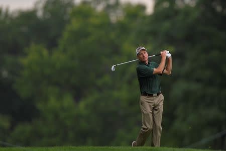 Aug 22, 2014; Paramus, NJ, USA; Jim Furyk hits his second shot on the 12th hole during the second round of The Barclays golf tournament at Ridgewood Country Club. Tommy Gilligan-USA TODAY Sports