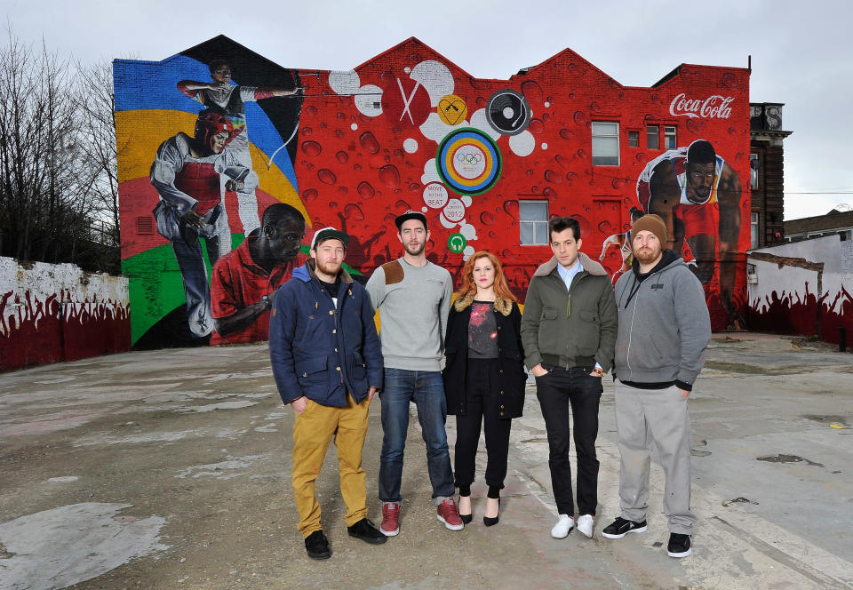 LONDON, ENGLAND - FEBRUARY 16: (L-R) Artists Hadley Ever, Neil Edward, Katy B, Mark Ronson and Sam Bates unveil the 'Beat Wall' during the launch of the Coca-Cola Move to the Beat campaign for the London 2012 Olympic Games in the shadow of the Olympic Stadium on February 16, 2012 in London, England. Coca Cola is launching the campaign in 11 countries. ( Gareth Cattermole/Getty Images for Coca-Cola)