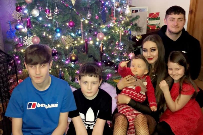 Kelly Lynch pictured with her brothers and sisters at Christmas time