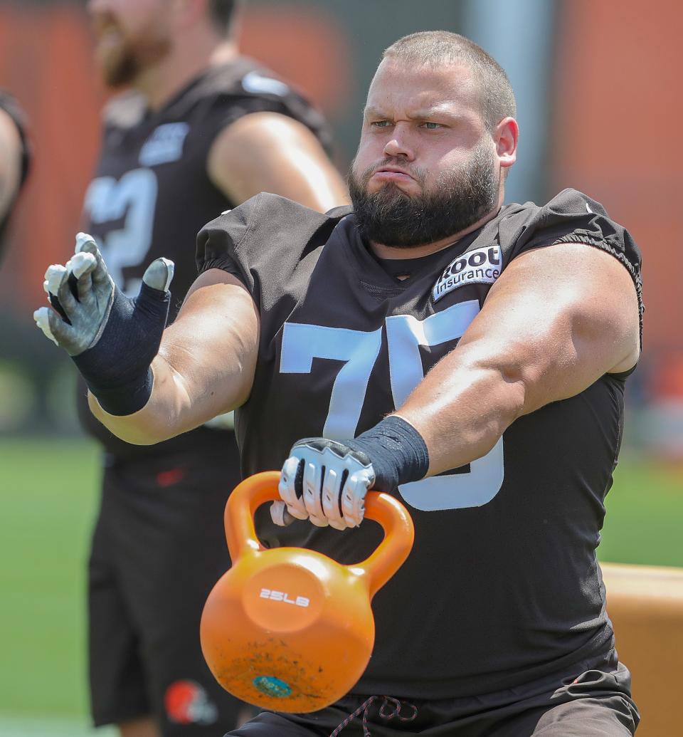 Cleveland Browns offensive lineman Joel Bitonio works on blocking techniques during training camp on Thursday, July 28, 2022 in Berea.