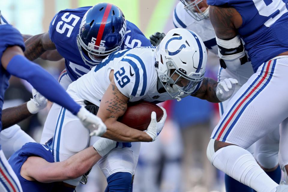 The Indianapolis Colts' Jordan Wilkins (29) carries the ball against the New York Giants on Jan. 1 in East Rutherford, New Jersey.