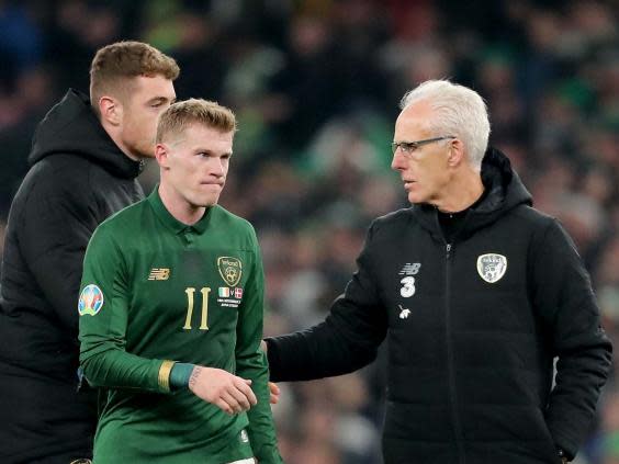 Mick McCarthy consoles James McClean (PA)