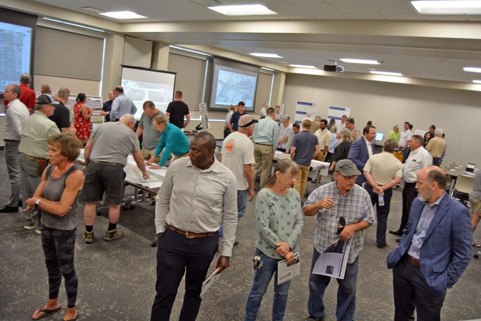 Columbia area residents particpate in a public input meeting Wednesday regarding Improve I-70 projects that will impact Columbia to Kingdom City.