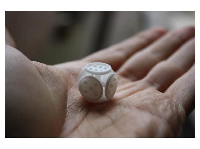 Spice up your next game of Yahtzee with a pair of these. Available for order in a variety of colors, <a href="http://www.shapeways.com/model/24041/die-floating-circles.html?li=productBox-search">purchase your own floating circle dice here</a>. 