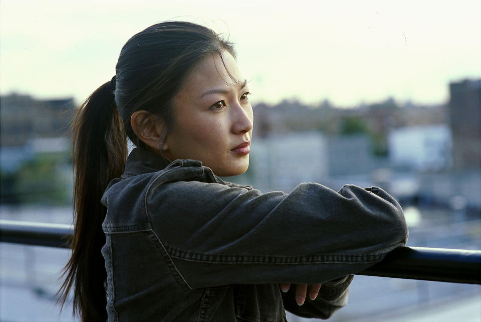 image of a woman looking outside