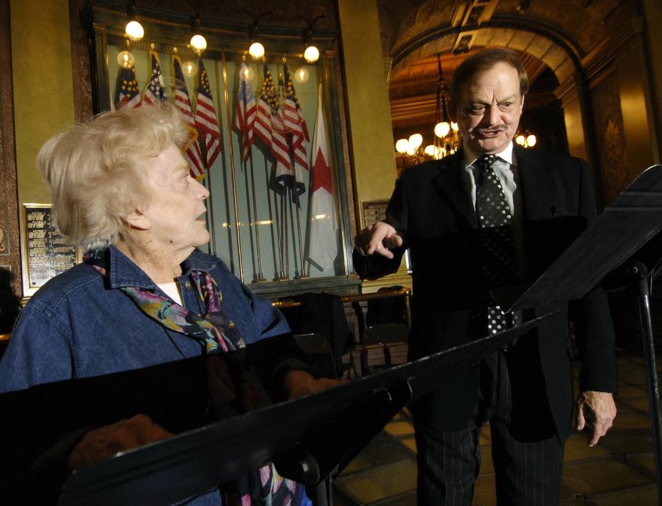Carmen Decker and Ken Beachler give a comedic reading of "I'm Herbert" in the rotunda at the State Capitol in February 2008.