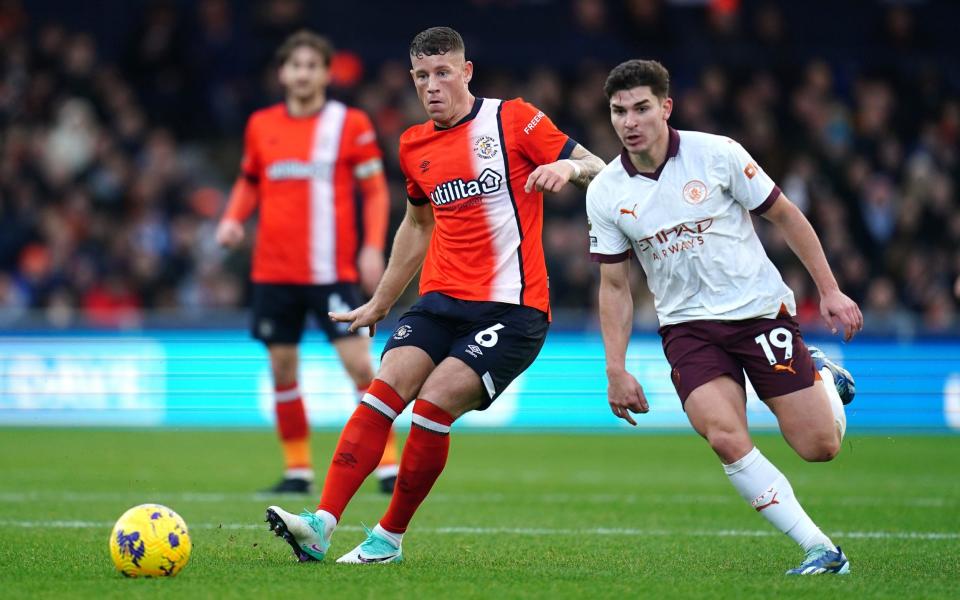 Ross Barkley (left) in action against Manchester City