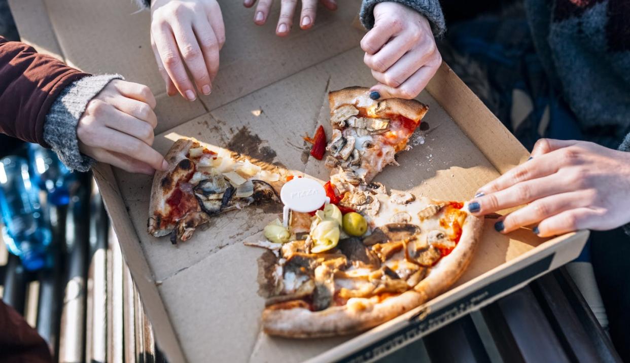 <span class="caption">Everyone wants a slice of the pie.</span> <span class="attribution"><a class="link " href="https://www.gettyimages.com/detail/photo/four-friends-eating-pizza-outdoors-partial-view-royalty-free-image/707450897" rel="nofollow noopener" target="_blank" data-ylk="slk:Westend61 via Getty Images;elm:context_link;itc:0;sec:content-canvas">Westend61 via Getty Images</a></span>