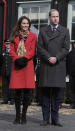 <p>For a day in Scotland, Kate chose a stylish red Armani coat with a tartan scarf and knee high Aquatalia boots. </p><p><i>[Photo: PA]</i></p>