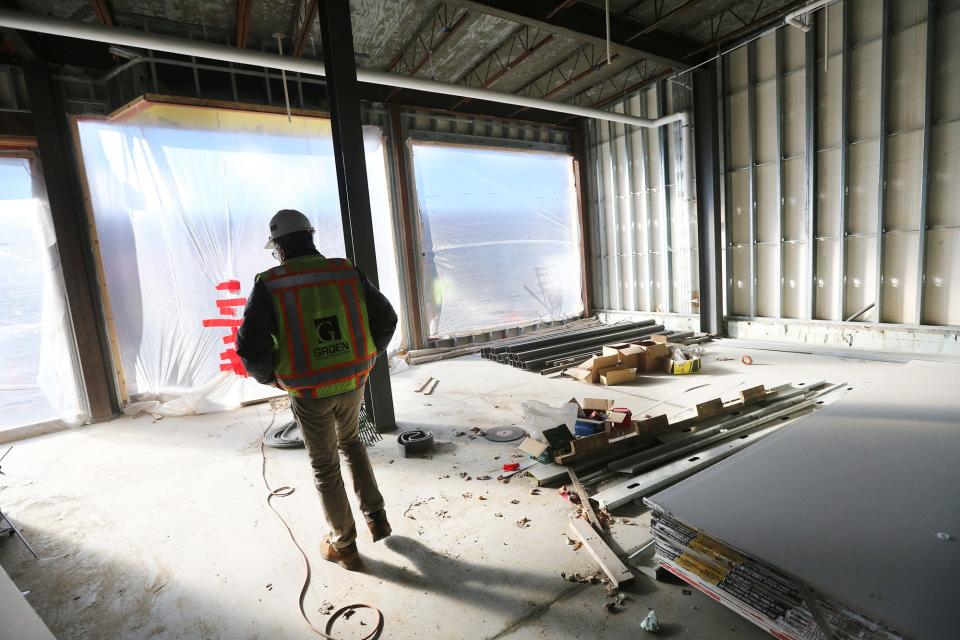 Steve King, construction project manager for The Howard building, stands in what may become a restaurant on one side or possibly two restaurants on the bottom floor of the Rochester structure.