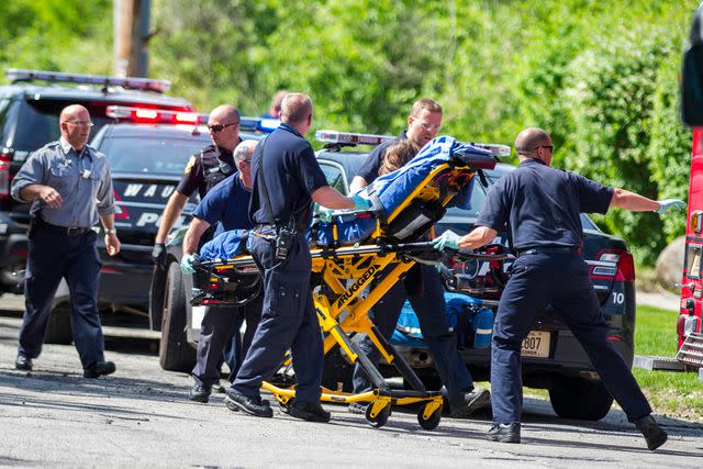 Abe Van Dyke/AP Photo In this May 31, 2014 file photo, rescue workers take 12-year-old stabbing victim Payton Leutner to an ambulance in Waukesha, Wisc..