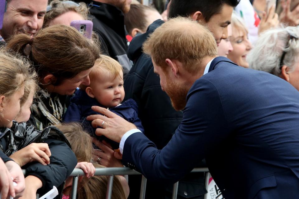 Prince Harry developed a quick connection with a fellow redhead when he and Meghan arrived for a public walkabout at the Auckland Viaduct.