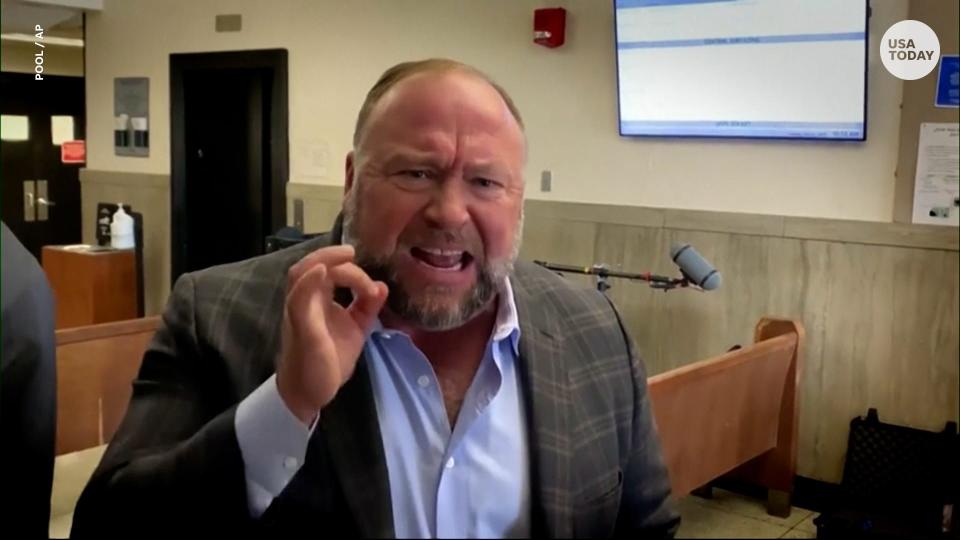 Alex Jones testifies that the Sandy Hook shooting was "100% real" during his trial on charges of defamation.