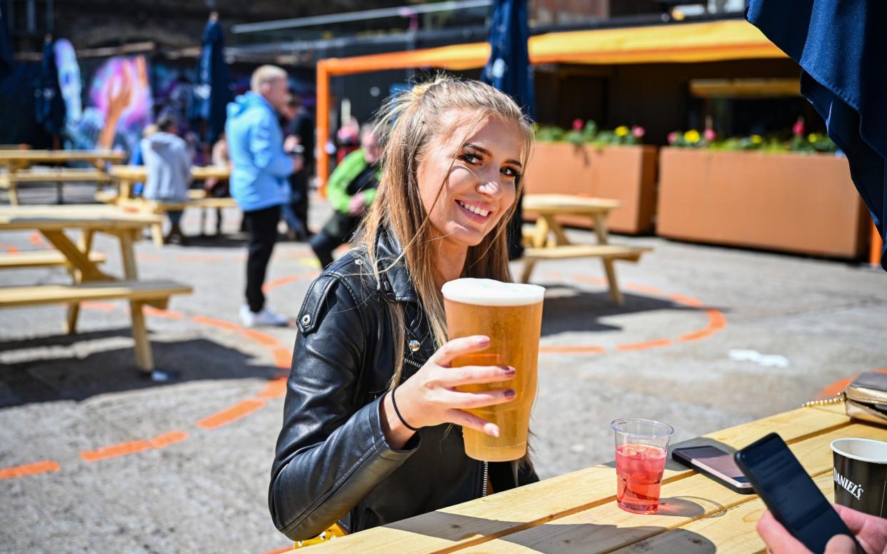 Drinkers enjoyed dry weather as pubs, as well as restaurants and cafes, were allowed to rreopen outdoor areas - Jeff J Mitchell/Getty