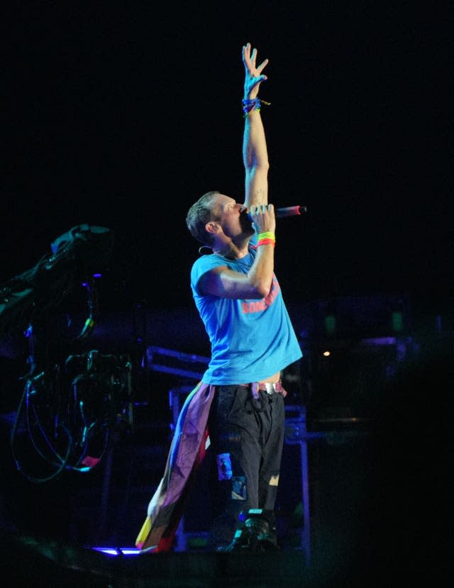 Chris Martin of Coldplay performs on the Pyramid Stage