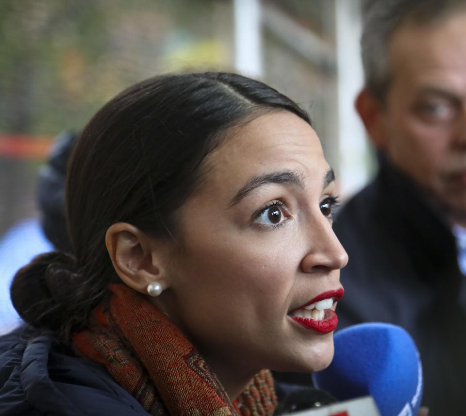 New York Democratic congressional candidate Alexandria Ocasio-Cortez speaks with reporters after voting, Tuesday Nov. 6, 2018, in the Parkchester community of the Bronx, N.Y. (AP Photo/Bebeto Matthews)