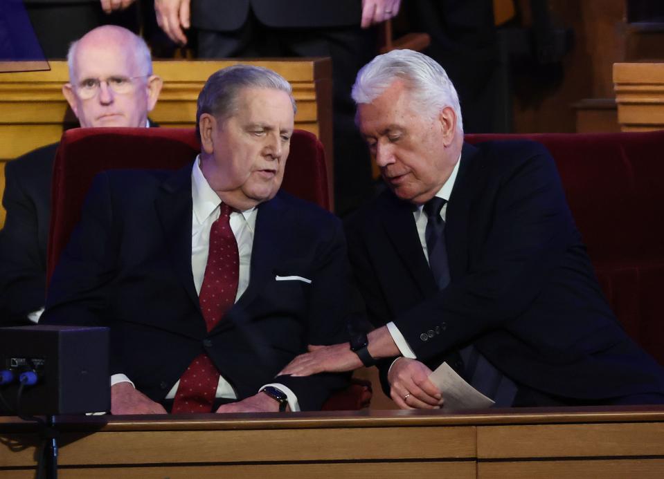 President Jeffrey R. Holland and Elder Dieter F. Uchtdorf comfort each other at the funeral for President M. Russell Ballard.